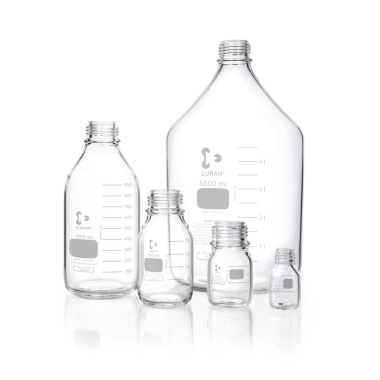 five DURAN clear laboratory glass bottles without screw caps in graduated sizes